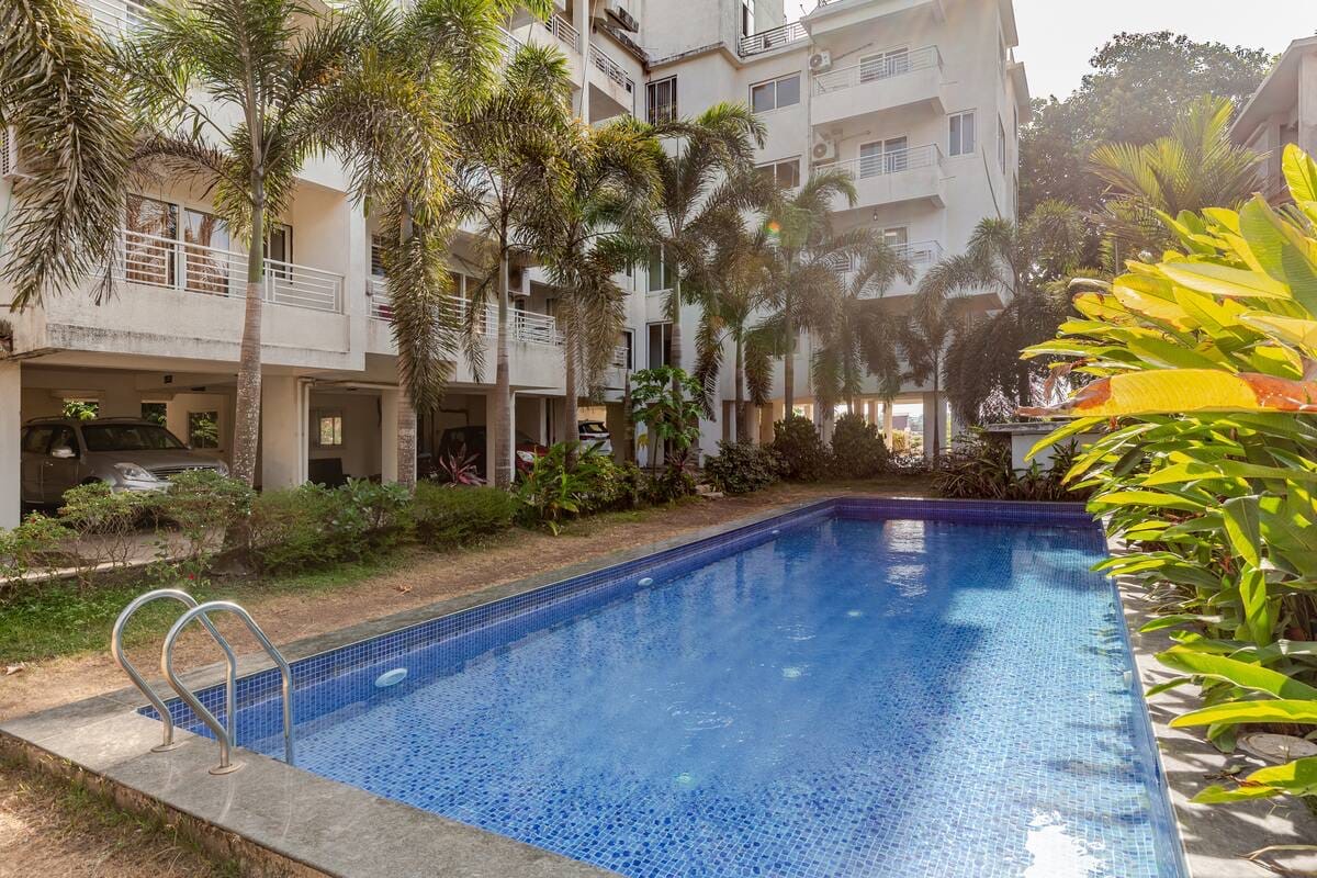 Swimming pool with palm trees